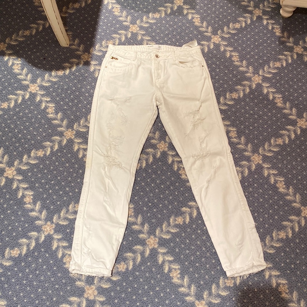 White ripped jeans